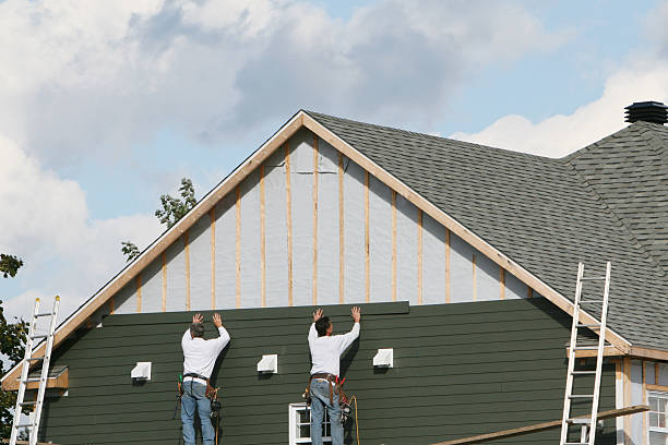 Professional Siding Installation technician working in Warren, PA